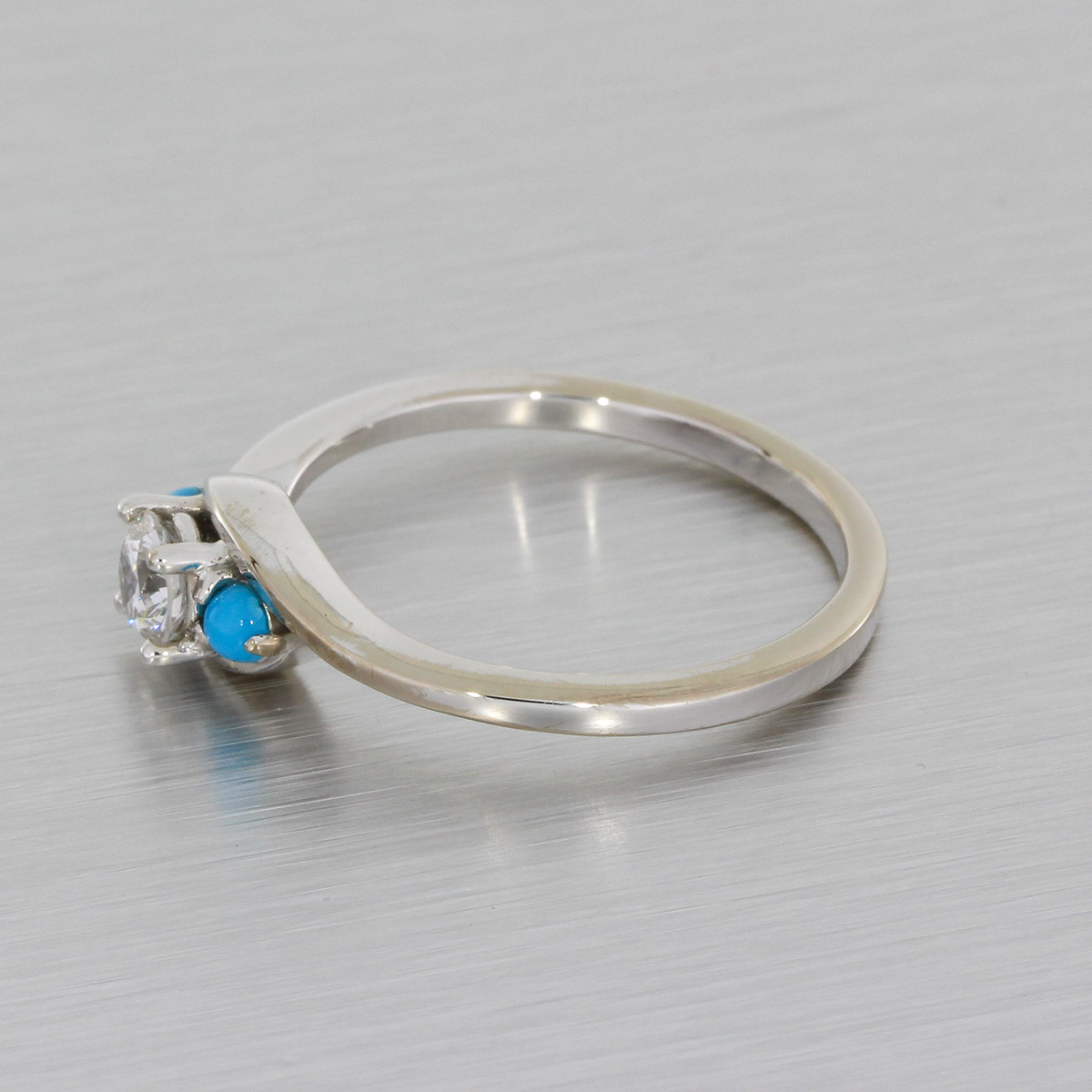 Diamond ring with on sale turquoise side stones